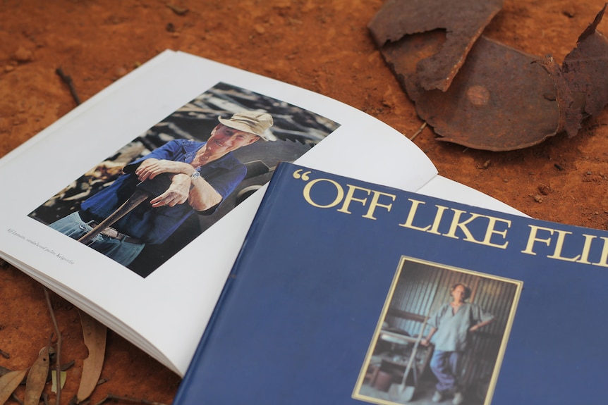 two books in red dirt