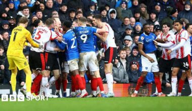 Players from Southampton and Portsmouth confront eachother after a heavy challenge in the game