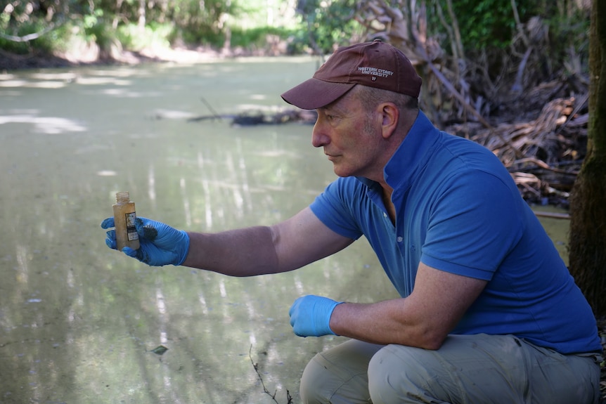 scientist Dr Ian Wright tests a water sample