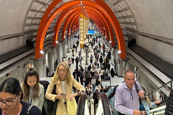 Commuters file out of Town Hall station on the first Monday morning for the new Metro Tunnel timetable.