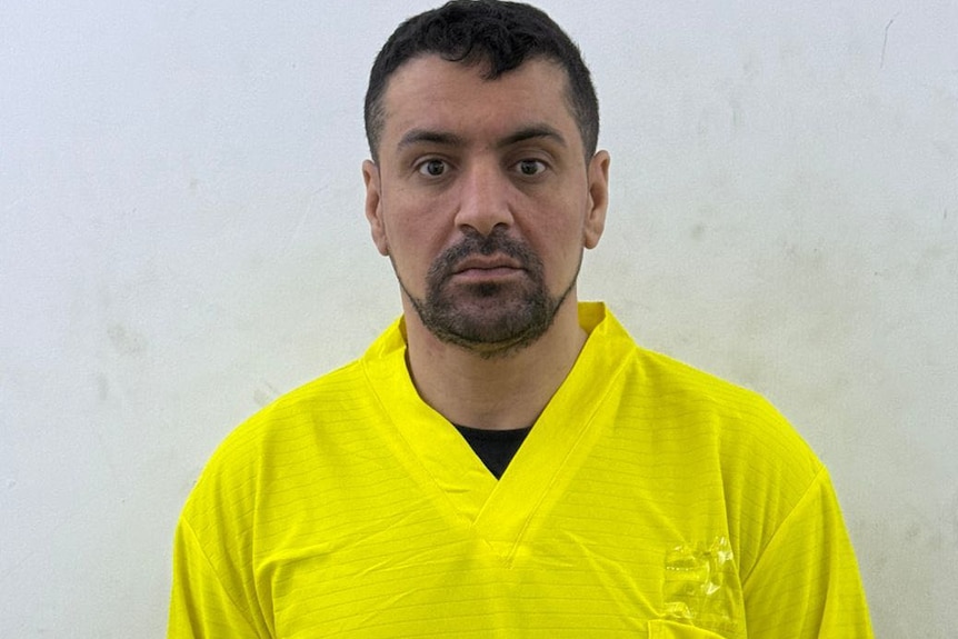 Kazem Hamad in a yellow top.
