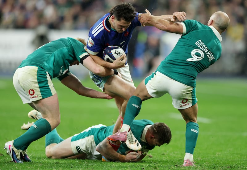 Nicolas Depoortère takes on Tommy O'Brien and Jamison Gibson-Park, who had his worst game for Ireland on Thursday. Photograph: David Rogers/Getty Images