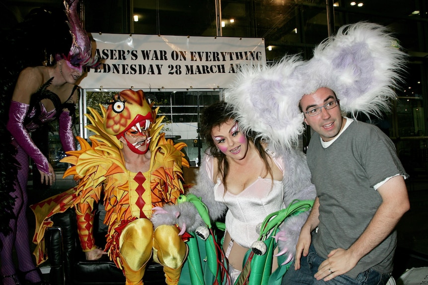 Julian Morrow with the then-cast of Priscilla Queen of the Desert: The Musical in the "live webcam countdown booth"