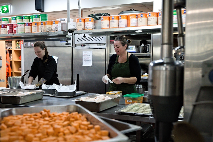 Chefs prepare meals in the kitchen at Casey Station.