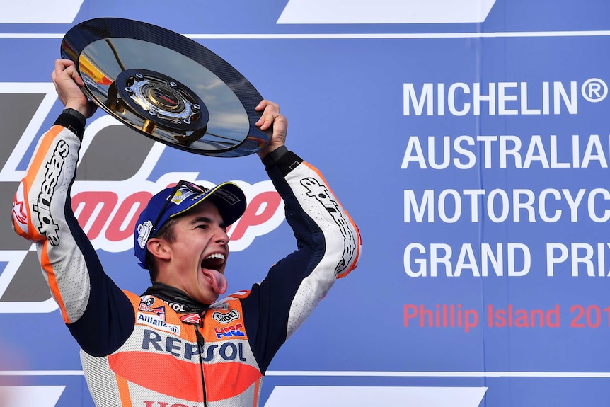 A man celebrates winning the grand prix at phillip island