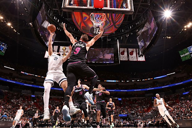 Ty Jerome drives to the basket.