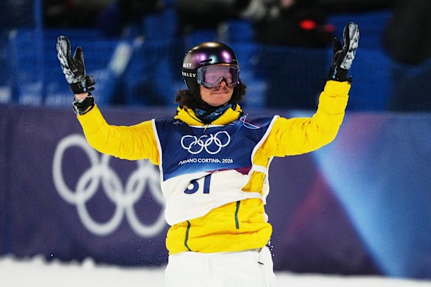 Australia's Valentino Guseli reacts during the men's snowboarding big air finals at the 2026 Winter Olympics, in Livigno, Italy, Saturday, Feb. 7, 2026. (AP Photo/Lindsey Wasson)