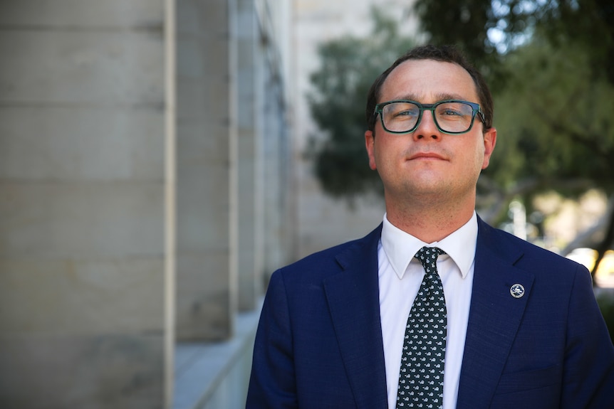 Headshot of Lachlan Hunter looking smug.