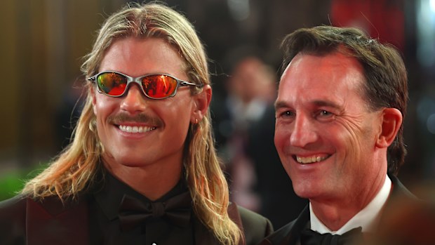 Bailey Smith of the Cats and Andrew Dillon, Chief Executive Officer of the AFL are seen during the 2025 Brownlow Medal 