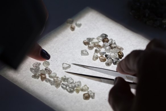 Rough diamonds being sorted by Alrosa, Russia’s biggest diamond producer, in Moscow.