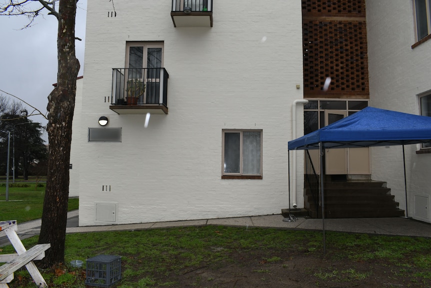 The outside of an apartment block.