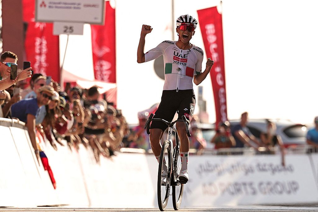 UAE Team Emirates's Mexican rider Isaac Del Toro Romero reacts after finishing first place in the sixth stage of the UAE Tour cycling event from al-Ain Museum to Jebel Hafeet in Abu Dhabi on February 21, 2026. (Photo by Fadel SENNA / AFP)