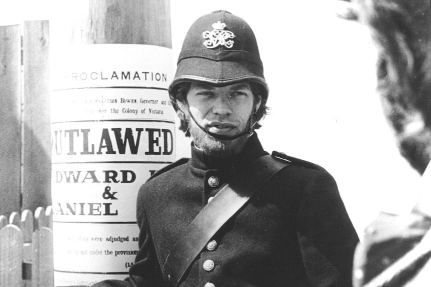 A man in a police uniform.