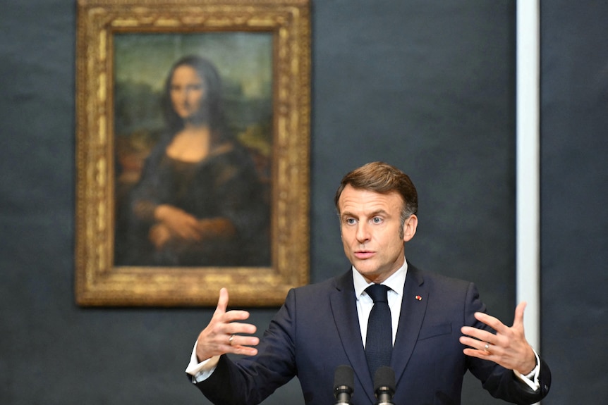 France's President Emmanuel Macron gives a speech at the Louvre Museum