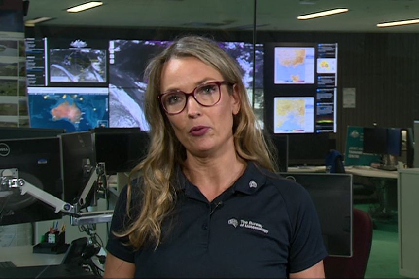 Senior meteorologist, Sarah Scully, speaking in the BOM Newsroom 