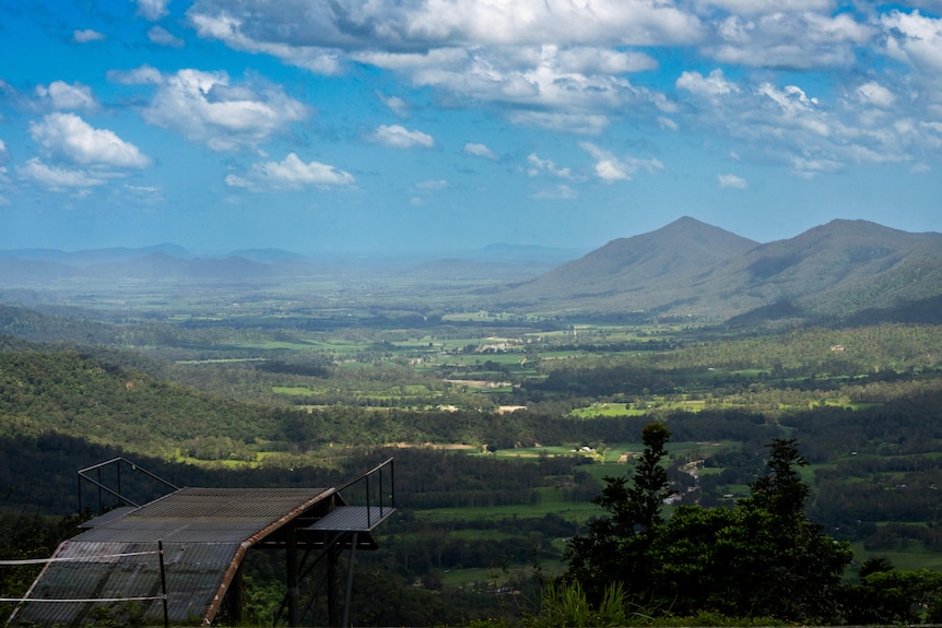 A view overlooking the lush green Pioneer Valley, dotted with farms.