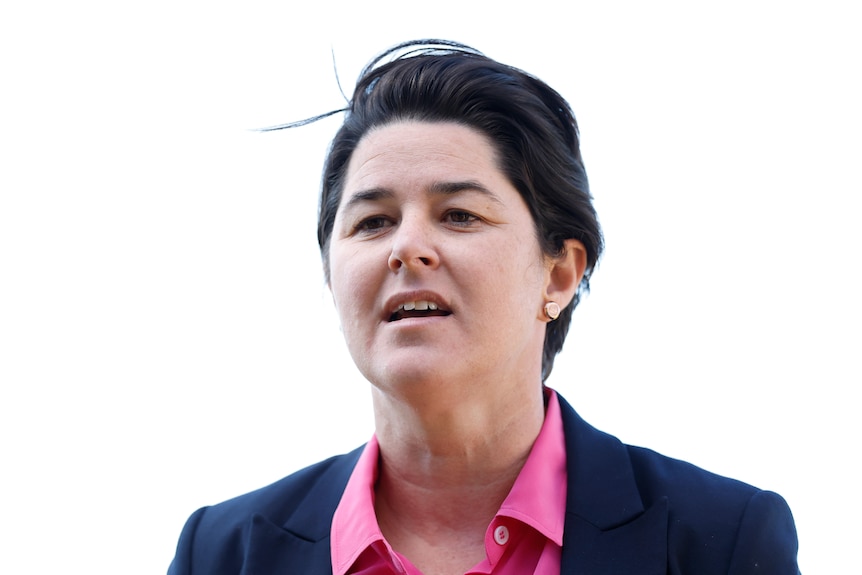 A close up of a woman with dark hair.