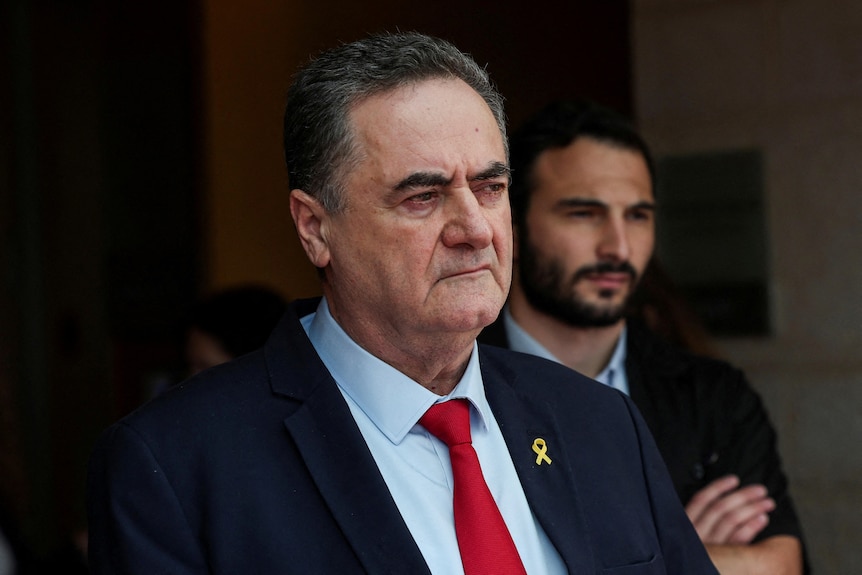 Israeli Foreign Minister Israel Katz wearing a suit and red tie.