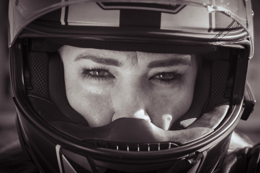 Close up of dykes on bikes club, front on with helmet. 