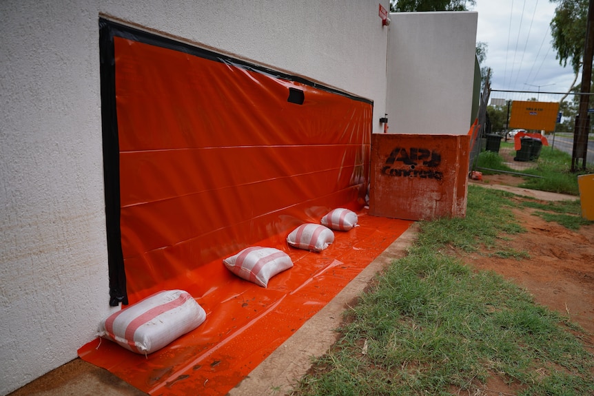 Sandbags stand ready to protect buildings from flooding