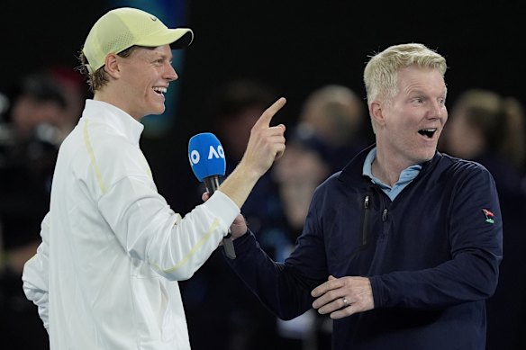 Jannik Sinner is interviewed on court by Jim Courier at last year’s Australian Open.