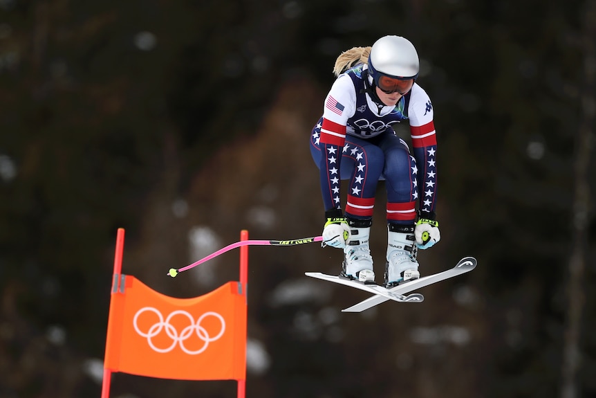 Lindsey Vonn leaps over a jump