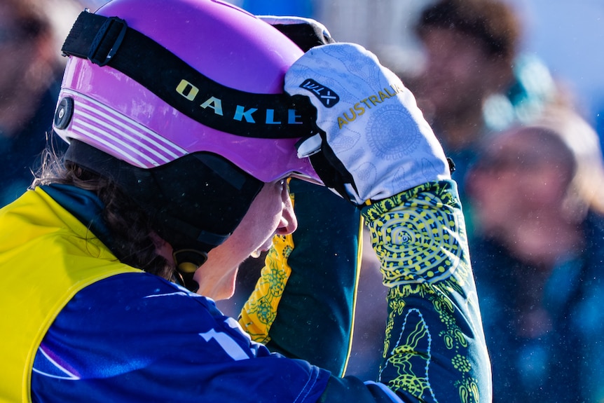 Josie Baff puts her hand on her head