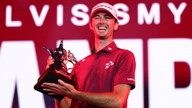 Elvis Smylie of Ripper GC poses for a photo with the trophy after winning the final round.