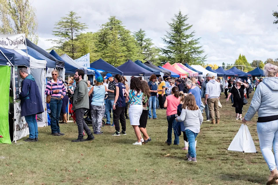 People at the stalls of The Seasons of New England Expo in Uralla. 
