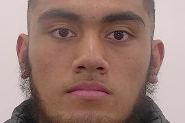 Headshot of Anthony Pele looking serious and straight ahead at camera