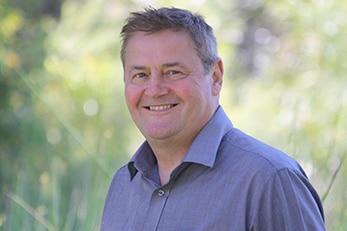 Richard Fulford smiles at the camera.