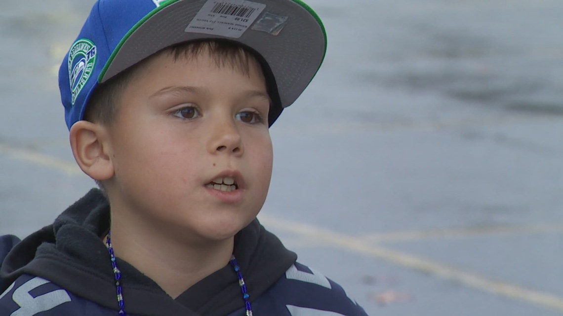 Sergeant surprises 8-year-old Seahawks fan who lost signed football at Super Bowl parade