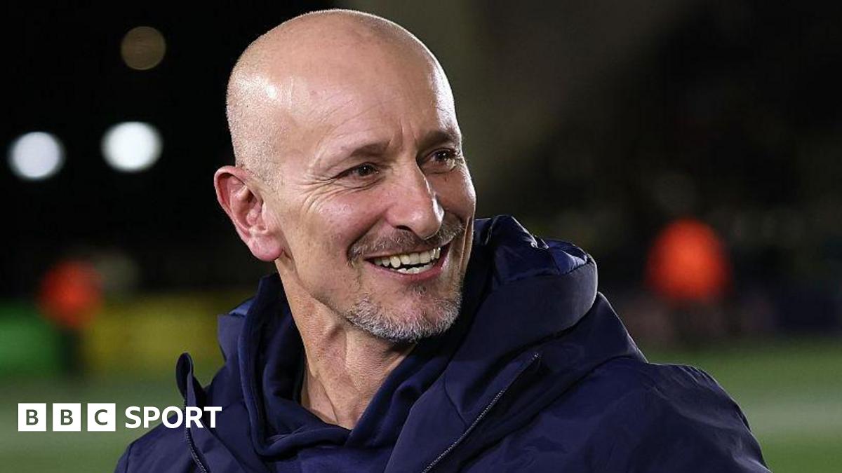 Alan Dickens smiles on the pitch after beating Gloucester in January