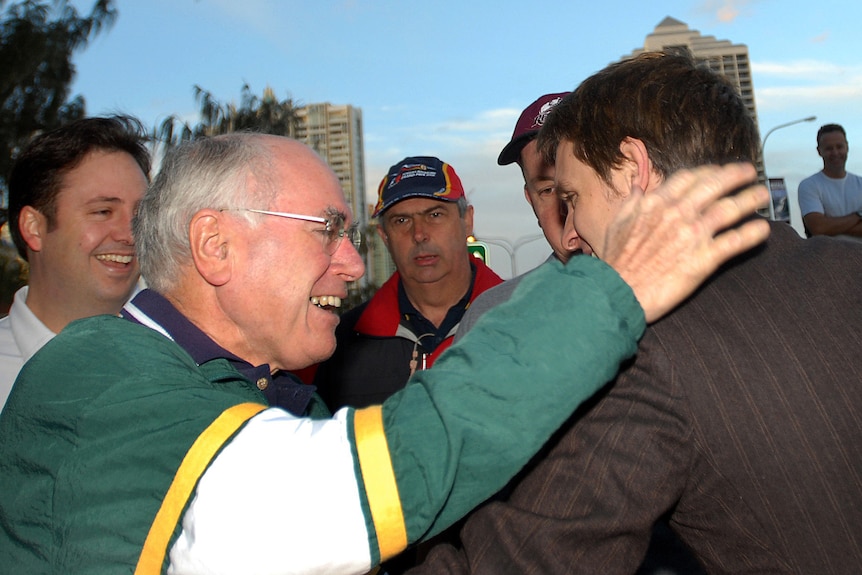 Reucassel approached then Prime Minister John Howard holding a fake axe as a prank during an early morning walk.