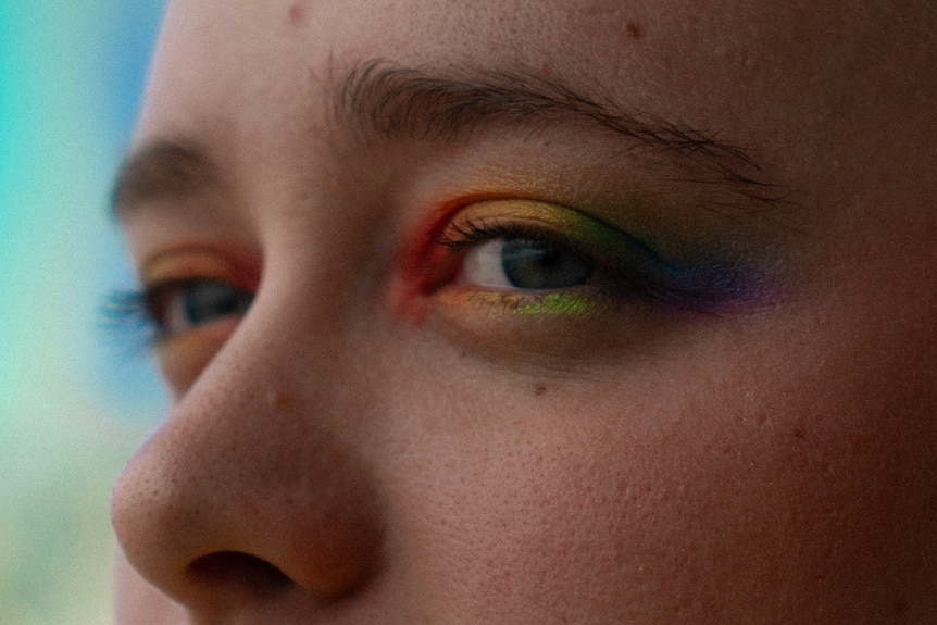 Twins eyes close up rainbow
