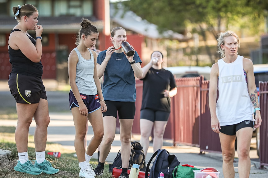Members of the Kyneton Women's Eagles Football Club at a training session.