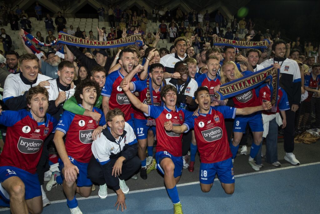 Newcastle Jets with their fans in Melbourne.
