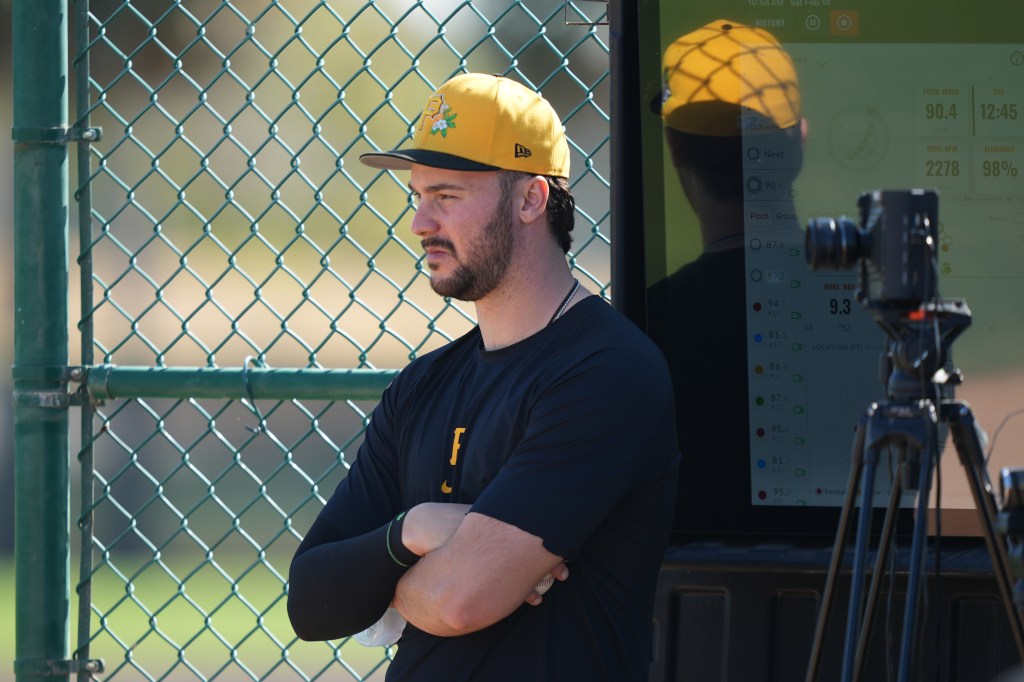 Pittsburgh Pirates' Paul Skenes watches workouts during spring training baseball Saturday, Feb. 14, 2026, in Bradenton, Fla. 