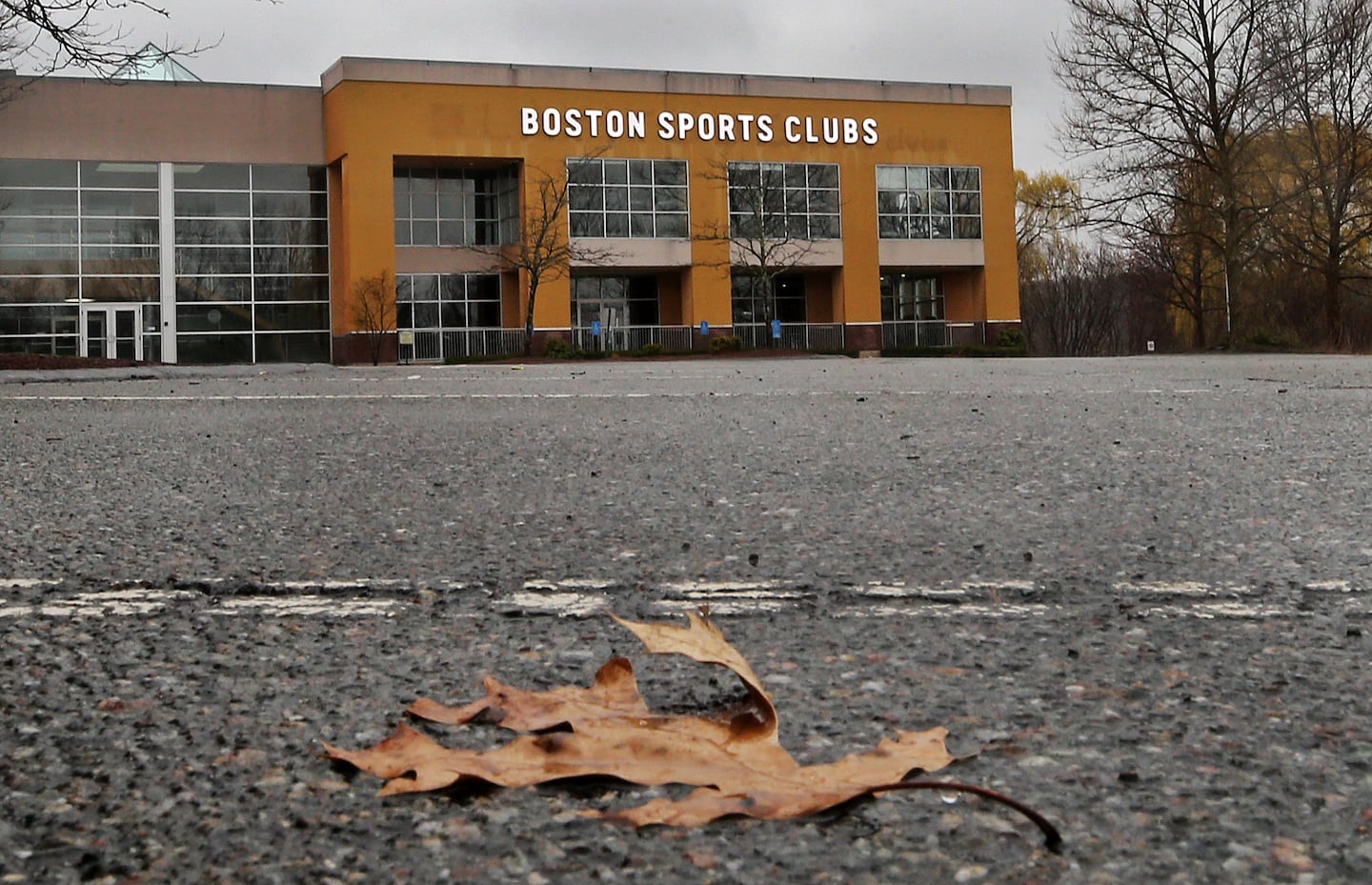 A Boston Sports Clubs' empty parking lot after closing in Methuen, on April 9, 2020.