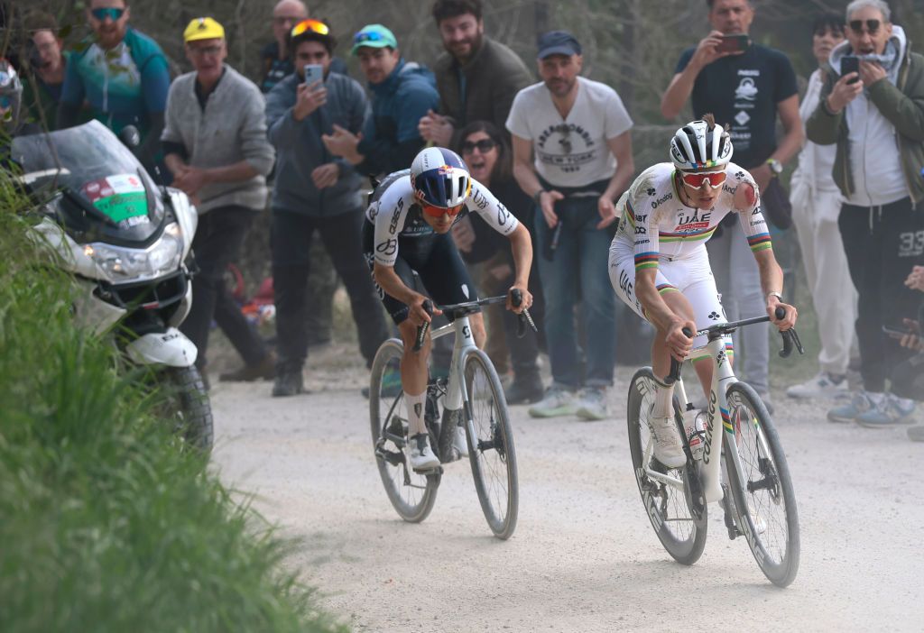 SIENA, ITALY - MARCH 08: (L-R) Tom Pidcock of The United Kingdom and Q36.5 Pro Cycling Team and Tadej Pogacar of Slovenia and UAE Team Emirates-XRG compete in the breakaway during the 19th Strade Bianche 2025, Men&amp;apos;s Elite a 213km one day race from Siena to Siena 320m / #UCIWT / on March 08, 2025 in Siena, Italy. (Photo by Luca Bettini - Pool/Getty Images)