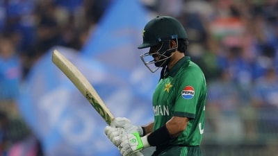 Pakistan's Babar Azam walks off after being dismissed. (REUTERS)