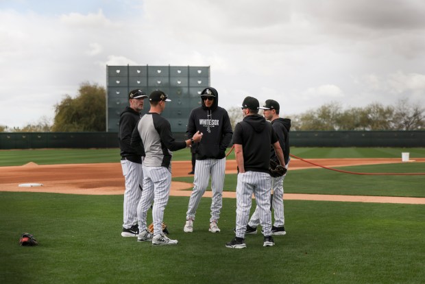 White Sox manager Will Venable speaks with coaches during spring training at Camelback Ranch on Feb. 18, 2026, in Glendale, Ariz. (Eileen T. Meslar/Chicago Tribune)