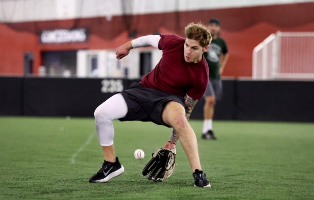 Zakk Suits makes a circus catch while taking fielding practice during the first team practice for the new Chicago Snowballs baseball team on Feb. 17, 2026, at The Dome at the Parkway Bank Sports Complex in Rosemont. (Chris Sweda/Chicago Tribune)