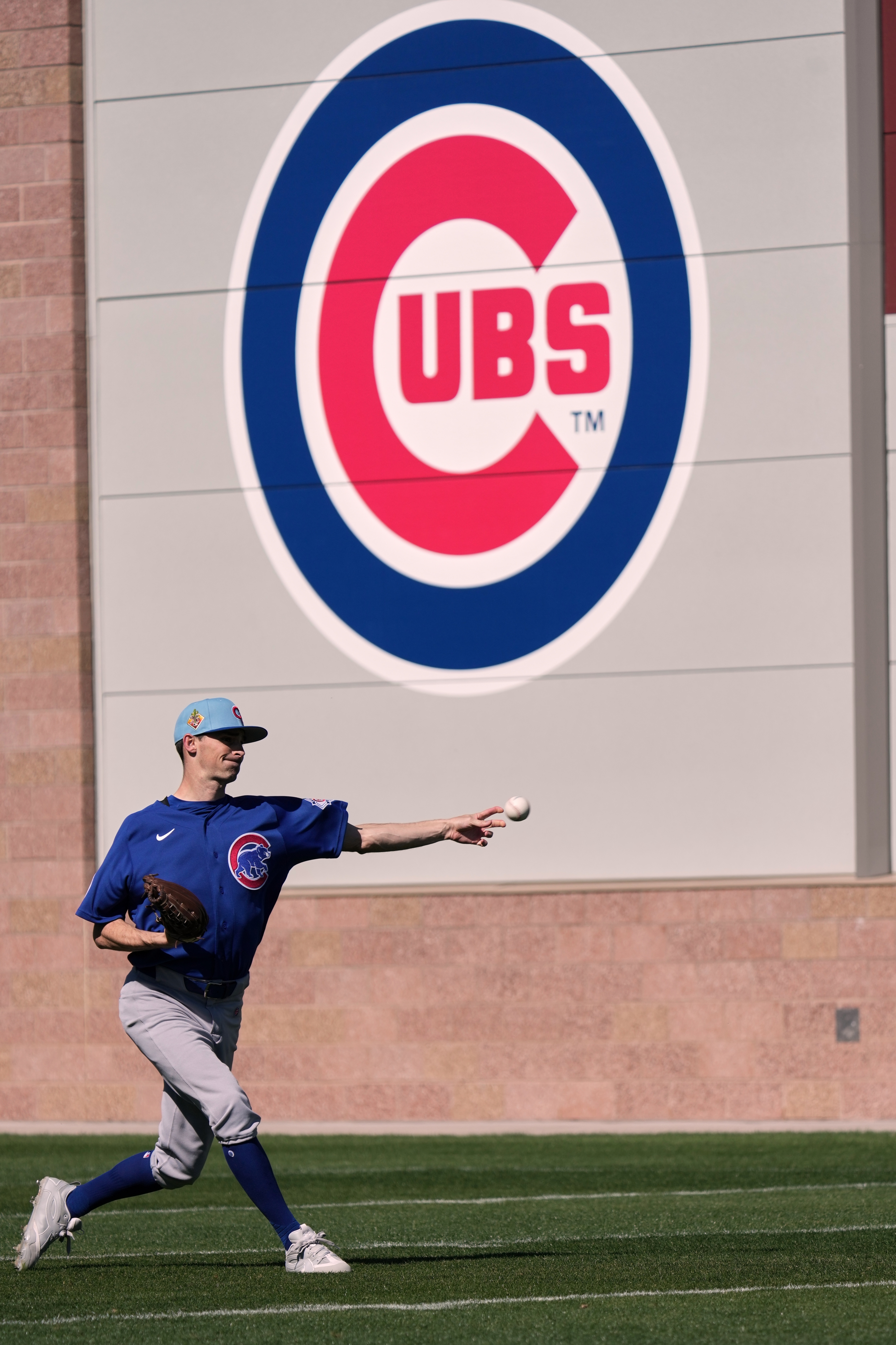 Cubs reliever Hoby Milner throws during a spring training workout...