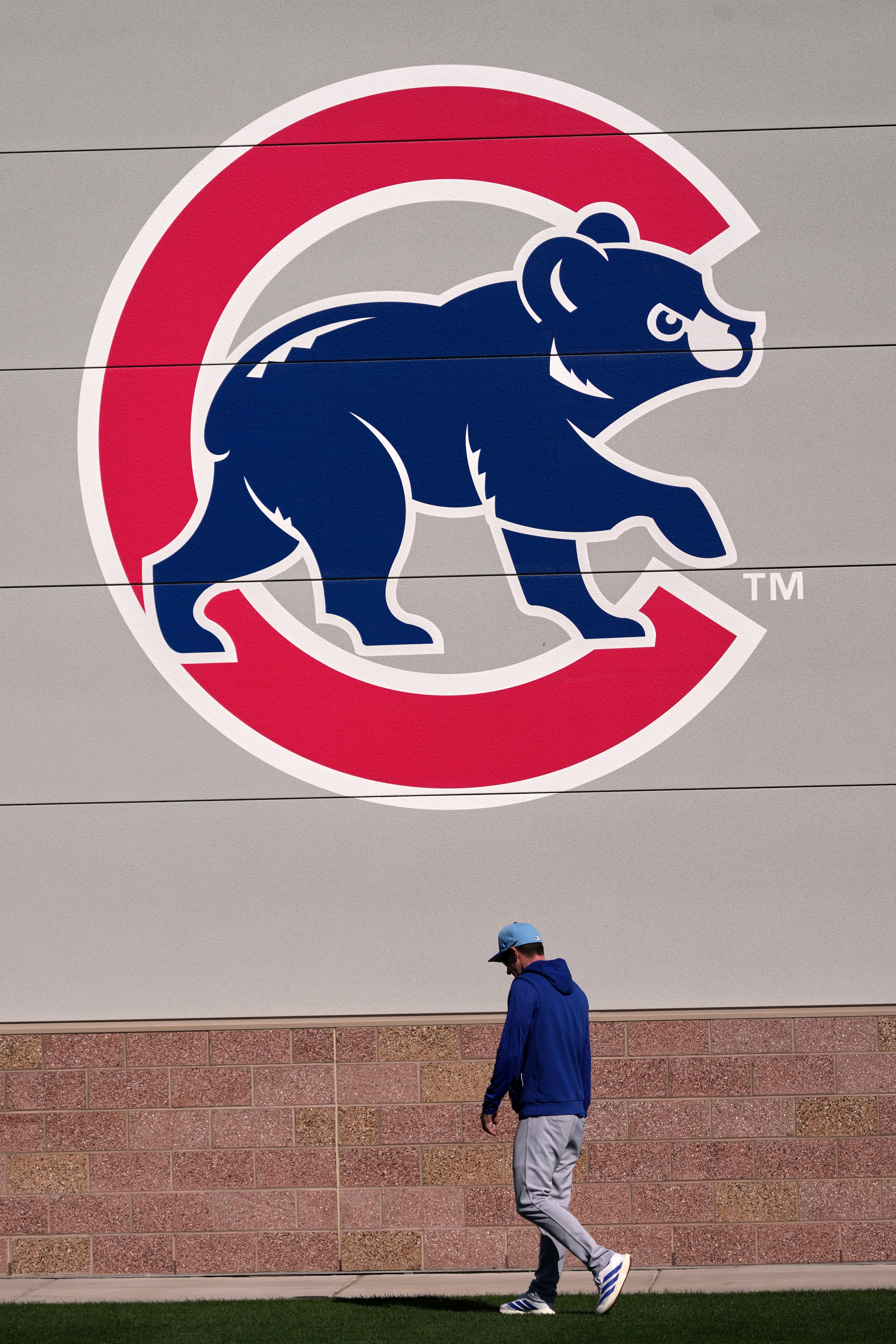 Cubs manager Craig Counsell walks to the batting cages during...