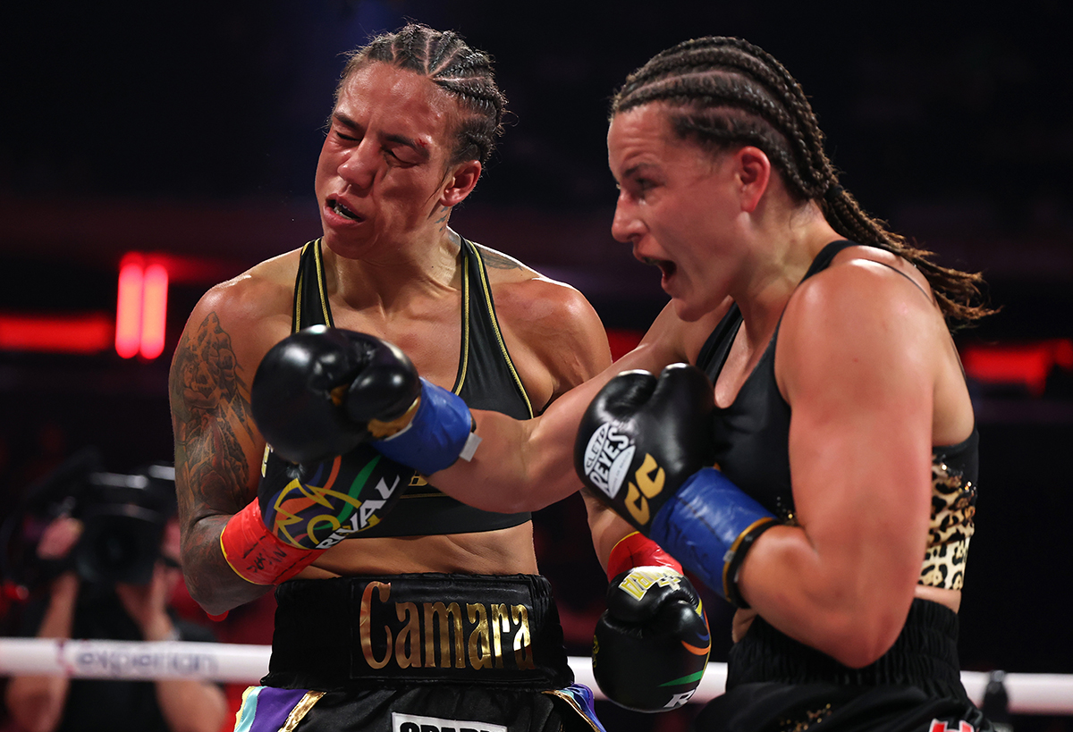 Chantelle Cameron drills Jessica Camara in their interim WBC super lightweight title bout. Photo: Al Bello/Getty Images for Netflix