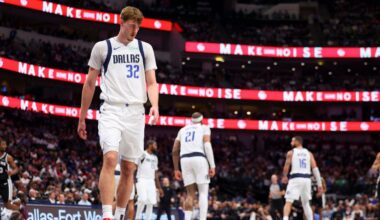 Dallas Mavericks forward Cooper Flagg (32) prepares to defend in the second half of an NBA basketball game against the San Antonio Spurs Thursday, Feb. 5, 2026, in Dallas. (AP Photo/Gareth Patterson)