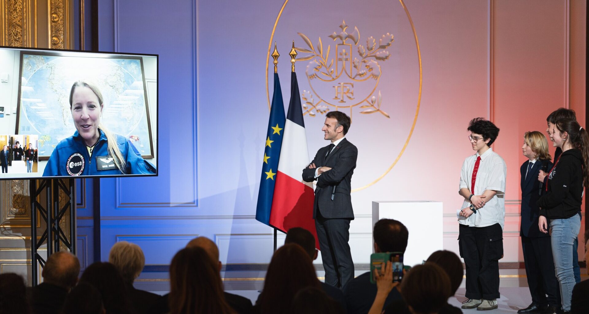 ESA astronaut Sophie Adenot speaking with French President Emmanuel Macron