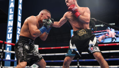 LOS ANGELES, CALIFORNIA - AUGUST 3: Isaac Cruz( black with silver shorts) and Jose Valenzuela (black with white shorts) during their WBA World Super Lightweight Titles Contest at BMO Stadium on August 3, 2024 in Los Angeles, California. (Photo by Mark Robinson/Matchroom Boxing/Getty Images)