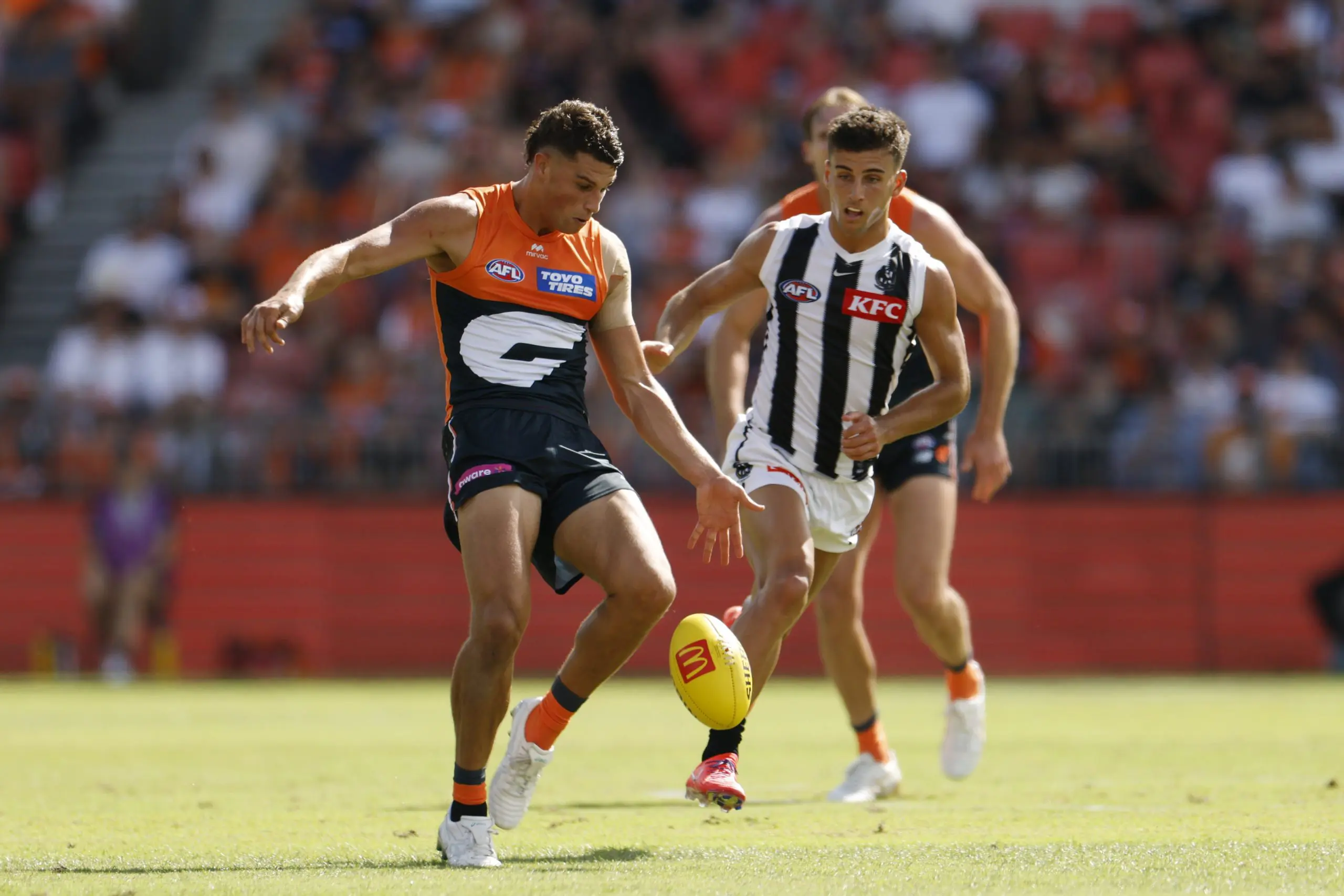 SYDNEY, AUSTRALIA - MARCH 09: Finn Callaghan of the Giants kicks the ball during the AFL Opening Round match between Greater Western Sydney Giants and Collingwood Magpies at ENGIE Stadium, on March 09, 2025, in Sydney, Australia. (Photo by Darrian Traynor/Getty Images)